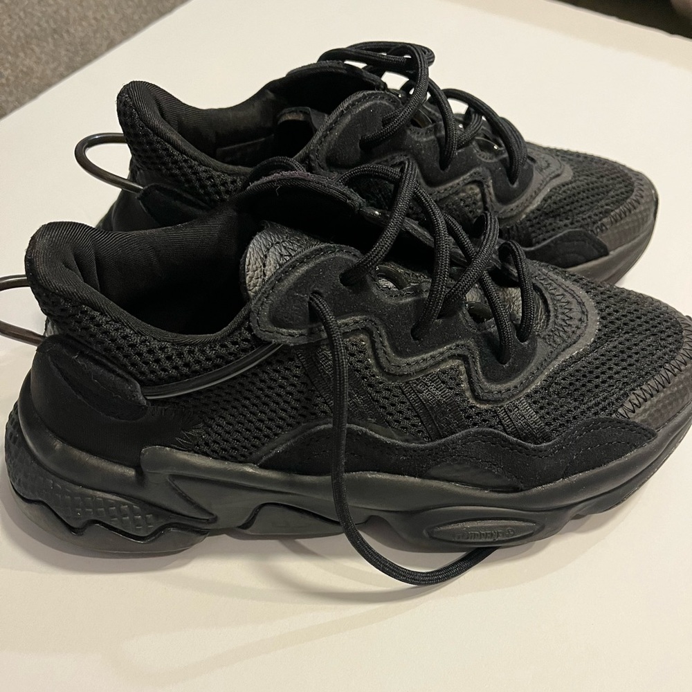 Black adidas OZWEEGO size 4 sneakers